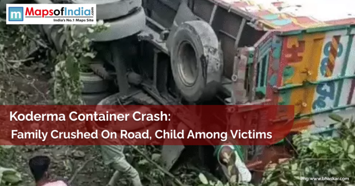 Overturned container truck lies off the road amid bushes after a fatal crash in Koderma, Jharkhand