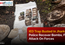 IED Trap Busted in Jharkhand: Police Recover Bombs, Foil Attack on Forces Recovered IEDs and explosive materials laid out on a plastic sheet in a forested area in Jharkhand, with police personnel standing nearby after foiling a planned attack.