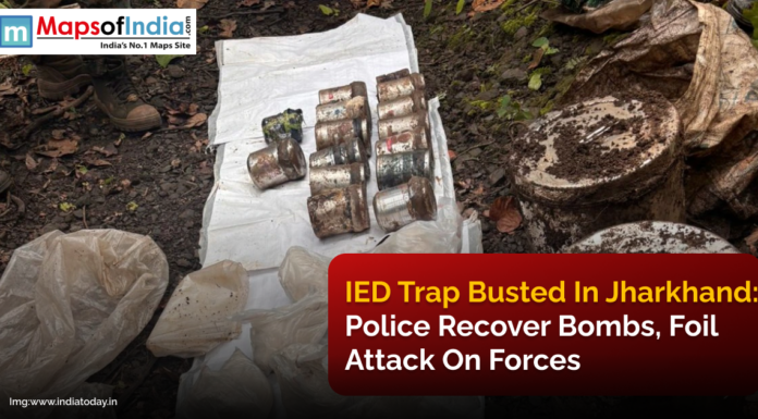 IED Trap Busted in Jharkhand: Police Recover Bombs, Foil Attack on Forces Recovered IEDs and explosive materials laid out on a plastic sheet in a forested area in Jharkhand, with police personnel standing nearby after foiling a planned attack.