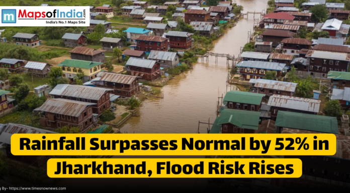 Rainfall Surpasses Normal by 52% in Jharkhand, Flood Risk Rises Aerial view of a flooded village area in Jharkhand with houses surrounded by muddy water due to heavy rainfall; text overlay reads "Rainfall Surpasses Normal by 52% in Jharkhand, Flood Risk Rises."