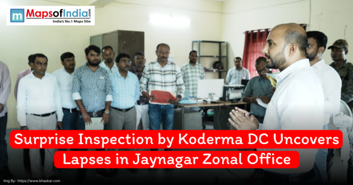 District Commissioner of Koderma conducting a surprise inspection at the Jayanagar Zonal Office, addressing staff members while uncovering administrative lapses.