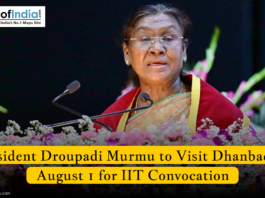 President Droupadi Murmu addressing an audience, with floral decorations in front, during an event; caption mentions her visit to Dhanbad on August 1 for IIT convocation.