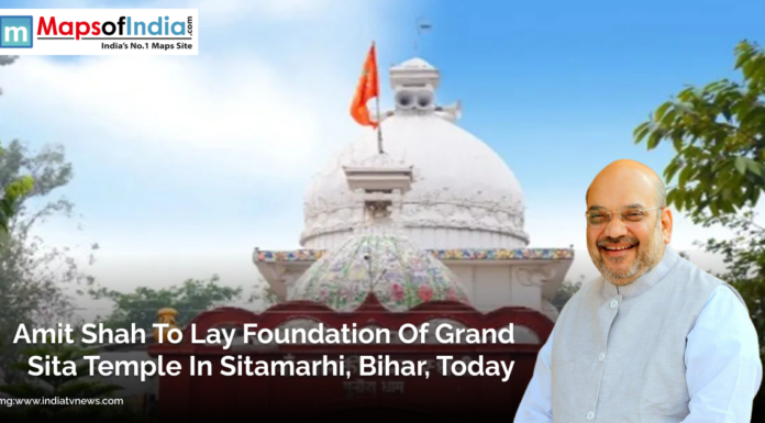 Amit Shah to Lay Foundation of Grand Sita Temple in Sitamarhi, Bihar, Today Amit Shah smiling in front of a white temple dome with an orange flag, representing the foundation laying ceremony of the Grand Sita Temple in Sitamarhi, Bihar.