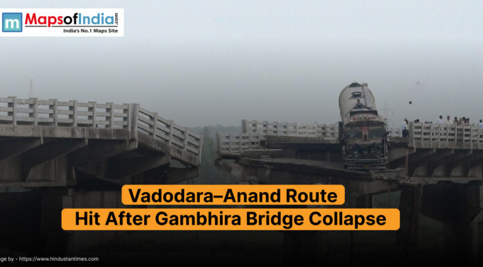 Vadodara–Anand Route Hit After Gambhira Bridge Collapse Collapsed section of the Gambhira Bridge on the Vadodara–Anand route, with a truck stranded on the broken edge and people gathered at the site.
