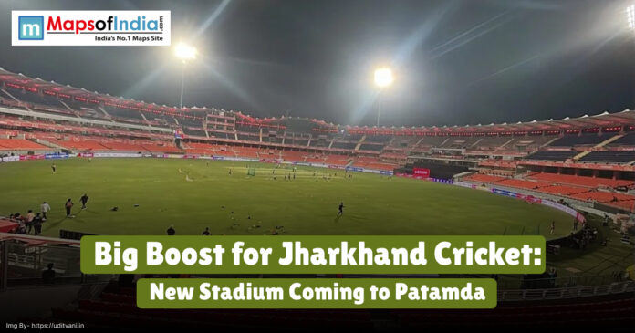 A brightly lit cricket stadium at night with players on the field, featuring the headline “Big Boost for Jharkhand Cricket: New Stadium Coming to Patamda” and the Maps of India logo in the top left corner.
