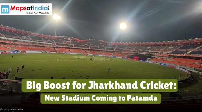 Big Boost for Jharkhand Cricket: New Stadium Coming to Patamda A brightly lit cricket stadium at night with players on the field, featuring the headline “Big Boost for Jharkhand Cricket: New Stadium Coming to Patamda” and the Maps of India logo in the top left corner.