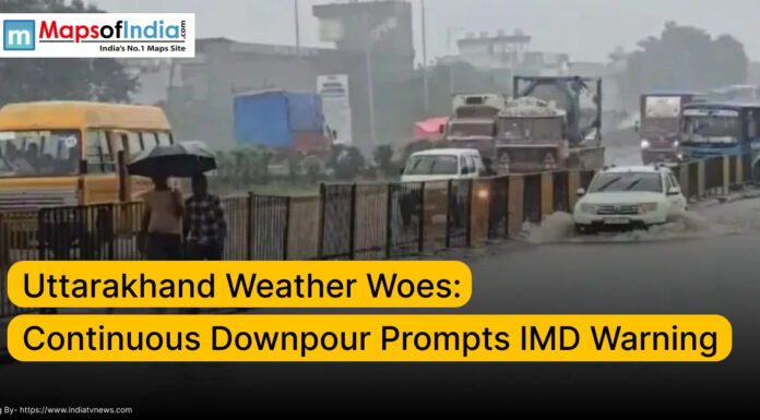 Uttarakhand Weather Woes: Continuous Downpour Prompts IMD Warning Heavy rain in Uttarakhand causes waterlogging on roads, with vehicles moving through flooded streets and pedestrians using umbrellas; IMD issues weather warning.