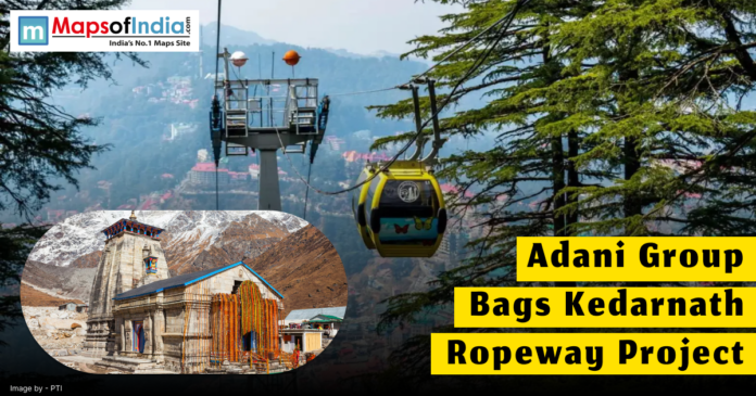 Image showing a cable car ropeway with trees and mountains in the background, inset with a picture of Kedarnath Temple, alongside headline text reading 'Adani Group Bags Kedarnath Ropeway Project'