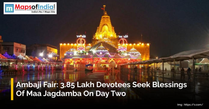 Ambaji temple illuminated with colorful lights during the fair, where lakhs of devotees gathered to seek blessings of Maa Jagdamba.