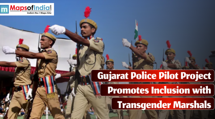Gujarat Police Pilot Project Promotes Inclusion with Transgender Marshals A group of uniformed Gujarat police officers, wearing beige uniforms with red plumes on their hats, march in formation during a parade, with the Indian flag visible in the background.