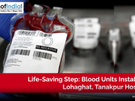 Close-up of an O negative blood unit held by a medical worker, highlighting the installation of life-saving blood units at Lohaghat and Tanakpur hospitals.