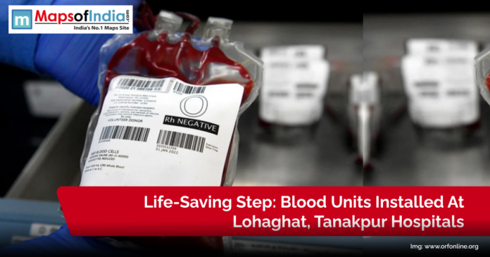 Close-up of an O negative blood unit held by a medical worker, highlighting the installation of life-saving blood units at Lohaghat and Tanakpur hospitals.