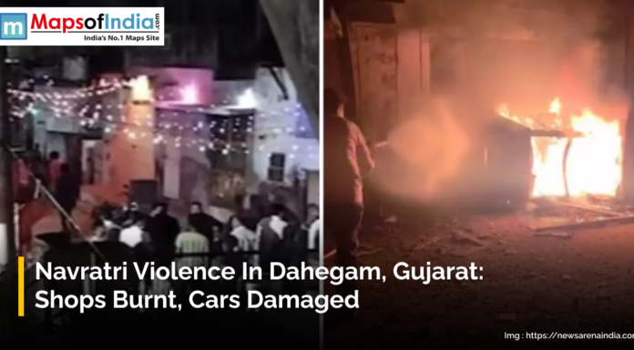 Navratri Violence in Dahegam, Gujarat: Shops Burnt, Cars Damaged Images showing Navratri violence in Dahegam, Gujarat, featuring a crowd gathered on a street decorated with lights and a scene of a car or object burning, causing flames and smoke.