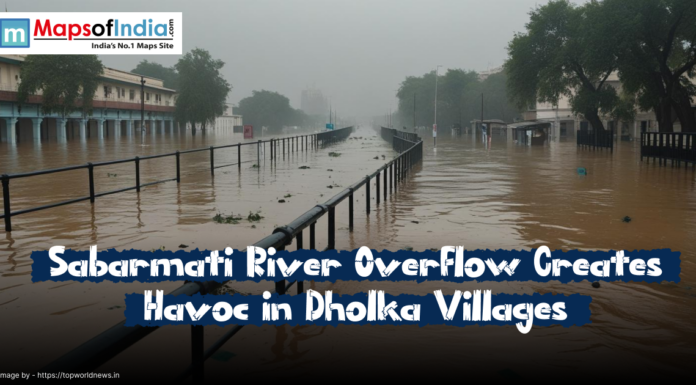 Sabarmati River Overflow Creates Havoc in Dholka Villages Flooded streets in Dholka villages as the Sabarmati River overflows, submerging roads and buildings under heavy waterlogging.