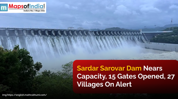 Sardar Sarovar Dam Nears Capacity, 15 Gates Opened, 27 villages on alert Sardar Sarovar Dam releasing water with multiple gates open, as authorities issue an alert for 27 villages due to rising water levels.