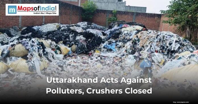 Large piles of industrial waste and garbage are seen inside a walled area in Uttarakhand, highlighting government action against polluters and the closure of illegal crushers.