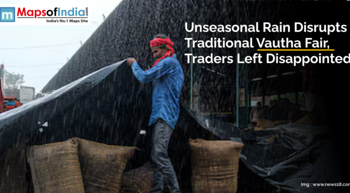 Unseasonal Rain Disrupts Traditional Vautha Fair, Traders Left Disappointed A trader covers goods with plastic sheets during heavy rain at the Vautha Fair in Gujarat, as unseasonal rainfall disrupts the traditional event and disappoints participants.