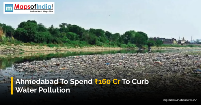 A polluted river in Ahmedabad filled with waste, with trees and buildings visible in the background.