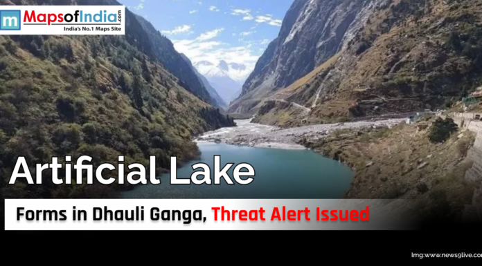 Uttarakhand: Artificial Lake Forms in Dhauli Ganga, Threat Alert Issued View of an artificial lake formed in the Dhauli Ganga river valley surrounded by steep mountain slopes, with a threat alert issued due to potential flooding risks.