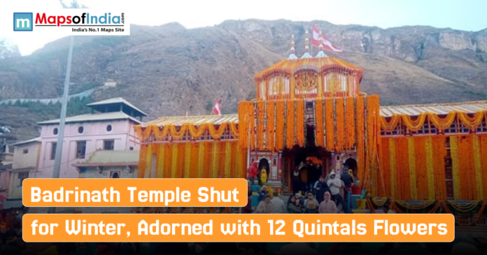 Badrinath temple Badrinath Temple decorated with marigold flowers as devotees gather before its closure for winter, set against a backdrop of mountainous terrain.