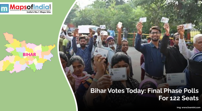 Bihar Votes Today: Final Phase Polls for 122 Seats Voters in Bihar stand in line showing their ID cards as they participate in the final phase of polling for 122 assembly seats during the state elections.