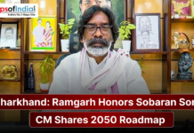 Jharkhand: Ramgarh Honors Sobaran Soren; CM Shares 2050 Roadmap A man in traditional white attire sits before a decorated shelf with portraits, alongside a banner reading “Jharkhand: Ramgarh Honors Sobaran Soren; CM Shares 2050 Roadmap.”