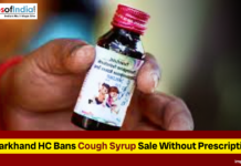 Jharkhand HC Bans Cough Syrup Sale Without Prescription A close-up of a person holding a small cough syrup bottle, accompanied by a headline stating that the Jharkhand High Court has banned the sale of cough syrup without a prescription.