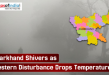 Jharkhand Shivers as Western Disturbance Drops Temperature Foggy winter scene with a colored map of Jharkhand overlayed, accompanied by a headline reporting that temperatures have dropped due to a western disturbance.