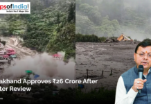 Uttarakhand Approves ₹26 Crore After Disaster Review A landslide-hit area in Uttarakhand with damaged buildings and debris, alongside a government official speaking into a microphone.