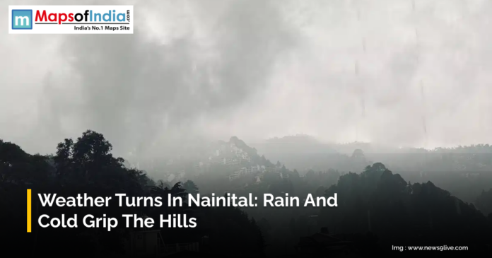 Dense clouds and mist cover the hills of Nainital as rain and cold weather grip the region, creating a foggy and chilly atmosphere in the hill town.