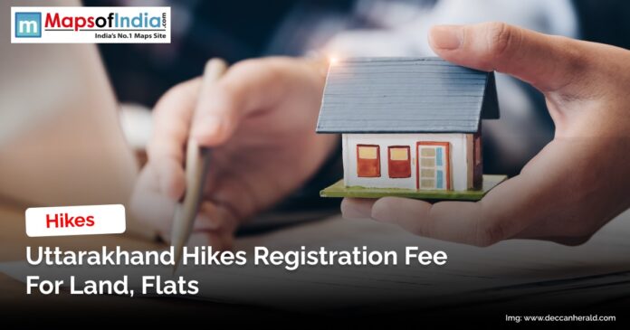 WhatsApp Image 2025-11-18 at 17.18.10_ada62f56 Hands holding a small model house and signing documents, with text announcing that Uttarakhand has increased registration fees for land and flats.