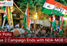 Bihar Polls: Phase 2 Campaign Ends with NDA-MGB Clash Political supporters wave party flags during a campaign rally in Bihar as the second phase of election campaigning concludes with a heated contest between the NDA and Mahagathbandhan alliances.