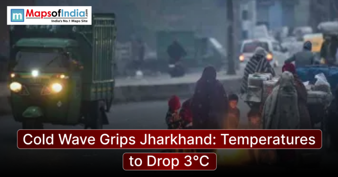 People wrapped in blankets gather around a small fire on a foggy street in Jharkhand as temperatures drop during a severe cold wave, with vehicles passing nearby.