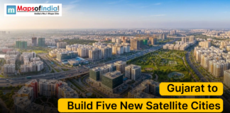 Gujarat to Build Five New Satellite Cities Aerial view of a modern urban cityscape in Gujarat with highways, residential complexes, and green spaces, representing the state’s plan to build five new satellite cities.