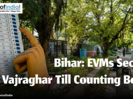 An EVM Mchine and a hand voting for Bihar Elections