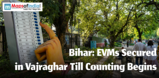 Bihar: EVMs Secured in Vajraghar Till Counting Begins An EVM Mchine and a hand voting for Bihar Elections