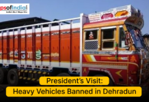 President’s Visit: Heavy Vehicles Banned in Dehradun Colorful Indian truck parked on a road with text announcing a ban on heavy vehicles in Dehradun during the President’s visit.