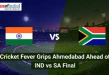 Cricket Fever Grips Ahmedabad Ahead of IND vs SA Final An aerial view of a packed cricket stadium at night under bright floodlights, divided into two halves featuring the national flags of India and South Africa. The text overlay reads, "Cricket Fever Grips Ahmedabad Ahead of IND vs SA Final."