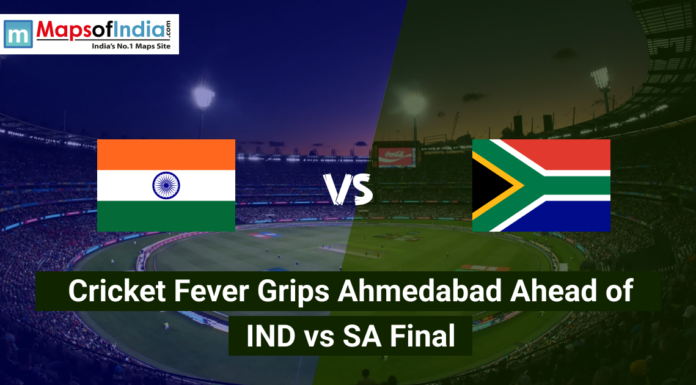 Cricket Fever Grips Ahmedabad Ahead of IND vs SA Final An aerial view of a packed cricket stadium at night under bright floodlights, divided into two halves featuring the national flags of India and South Africa. The text overlay reads, "Cricket Fever Grips Ahmedabad Ahead of IND vs SA Final."