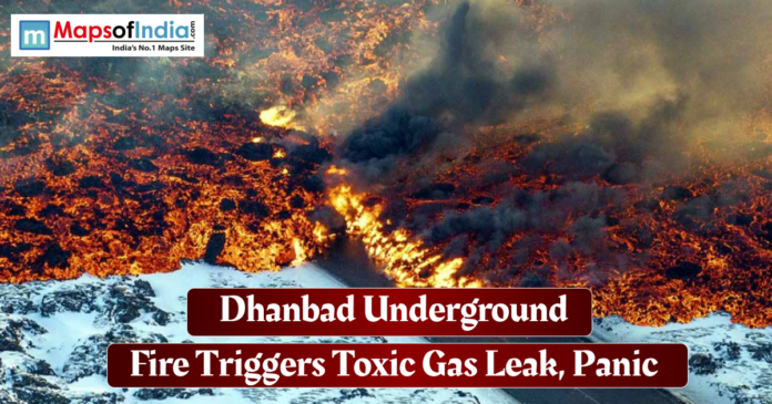 Dhanbad Underground fire Underground fire in Dhanbad releasing thick smoke and toxic gases, creating a scene of intense flames and rising black fumes.
