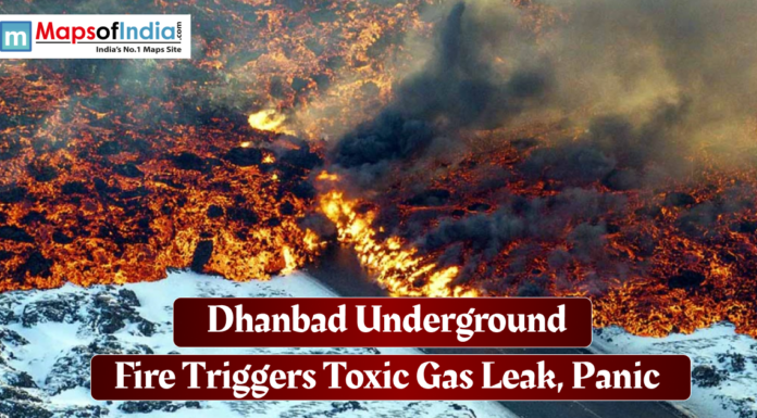 Dhanbad Underground Fire Triggers Toxic Gas Leak, Panic Underground fire in Dhanbad releasing thick smoke and toxic gases, creating a scene of intense flames and rising black fumes.