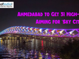 Ahmedabad to Get 31 High-Rises, Aiming for ‘Sky City’ Tag Night view of Ahmedabad’s illuminated footbridge over the Sabarmati River with colorful lights, highlighting news about the city planning 31 new high-rise buildings to earn the ‘Sky City’ tag.