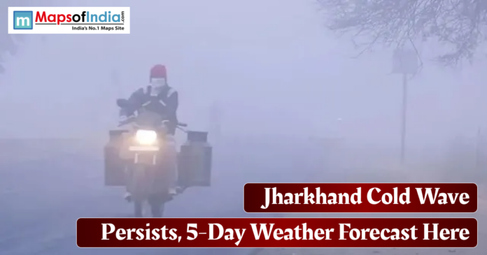 Motorcyclist riding through dense fog during a cold wave in Jharkhand, highlighting low visibility and severe winter weather conditions.