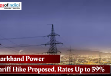 Jharkhand Power Tariff Hike Proposed, Rates Up to 59% Jharkhand power transmission towers at night with city lights in the background and headline reading “Jharkhand Power Tariff Hike Proposed, Rates Up to 59%” from Maps of India.