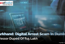 Jharkhand: Digital Arrest Scam in Dumka, Professor Duped of ₹15 Lakh A person sitting in a hooded outfit holding a laptop