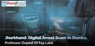 Jharkhand: Digital Arrest Scam in Dumka, Professor Duped of ₹15 Lakh A person sitting in a hooded outfit holding a laptop