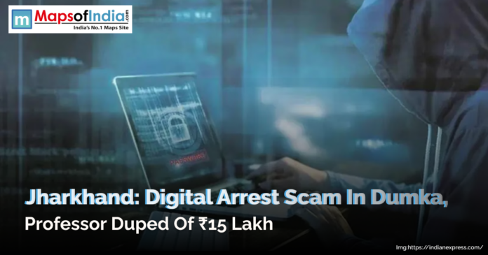 A person sitting in a hooded outfit holding a laptop