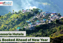 Mussoorie Hotels 80% Booked Ahead of New Year Hilltop view of Mussoorie town with hotels amid lush green mountains.