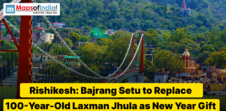 Rishikesh: Bajrang Setu to Replace 100-Year-Old Laxman Jhula as New Year Gift Bajrang Setu suspension bridge in Rishikesh over the Ganga River, set to replace the 100-year-old Laxman Jhula, with hills and temples in the background.