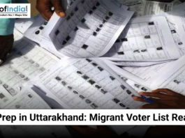 Hands sorting through printed voter lists during preparations in Uttarakhand for the migrant voter registry.